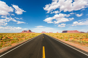 Monument valley road going to the horizon