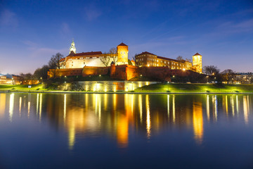Wawel Castle in the evening in Krakow with reflection in the river, Poland. Long time exposure