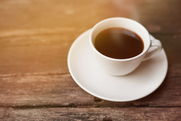 Cup of hot espresso coffee with vintage tone.