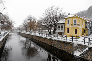 Fototapeta na wymiar Picturesque winter scene by the river of Florina, a small town in northern Greece 