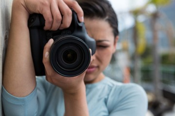 Female photographer with digital camera