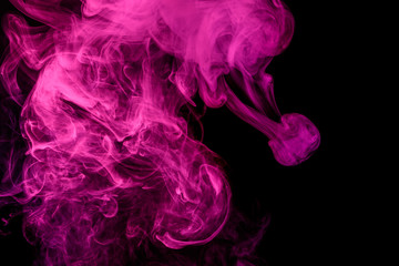 Abstract smoke Weipa. Personal vaporizers fragrant steam. The concept of alternative non-nicotine smoking. Magenta smoke on a black background. E-cigarette. Evaporator. Taking Close-up. Vaping.