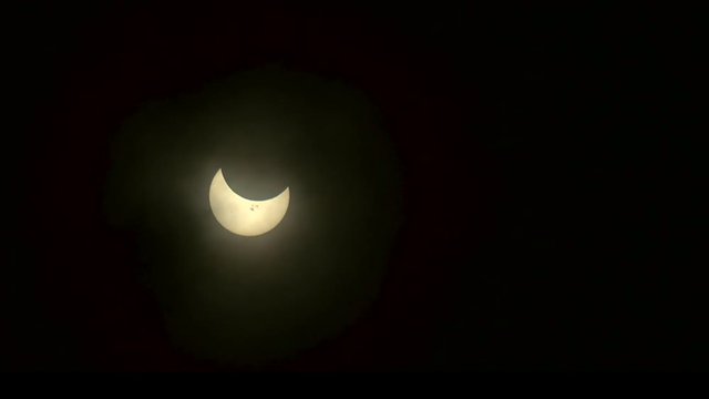 Crescent Sun Partial Eclipse with Giant Sunspots