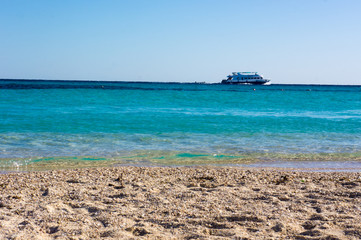 Nice view of the red sea from the paradise island. Ship passing by