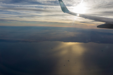 A view from the airplane window, sky in the beautiful sunset