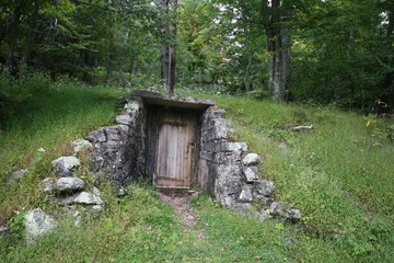 wood door, stone passageway underground on Appalachian trail - 134917618