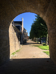 Houses seen through a gate
