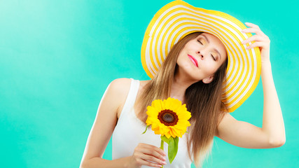 portrait attractive woman with sunflower