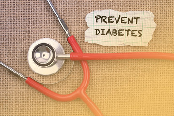 Stethoscope, paper with word “ PREVENT.DIABETES “. Medical Concept