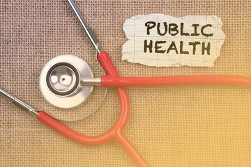 Stethoscope, paper with word “ PUBLIC.HEALTH “. Medical Concept