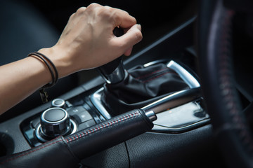 girl driving car moving transmission shift gear