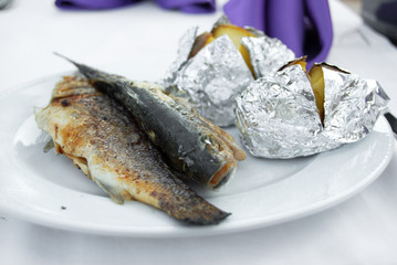 grilled trout with potatoes in foil