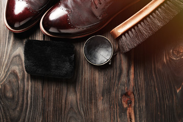 leather shoes on table with polishing equipment. Fashion handmade. Wax