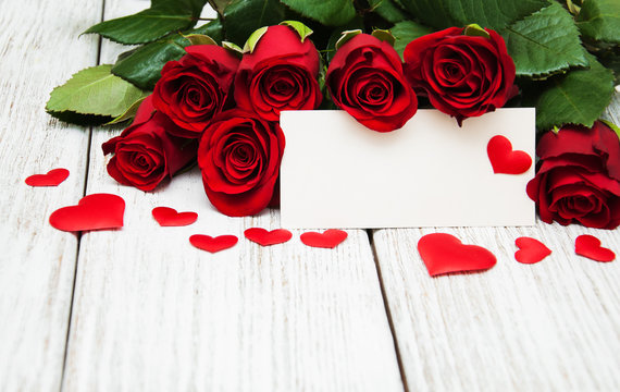 Red roses and greeting card