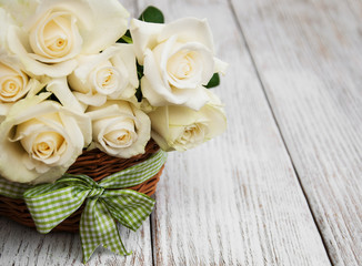 White roses in a basket