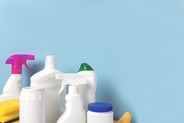 house cleaning products on blue background