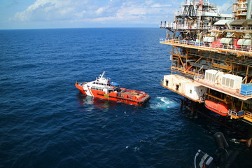 Naklejka premium Supply boat transfer cargo to oil and gas industry