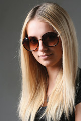 Fototapeta premium portrait of a beautiful girl in glasses