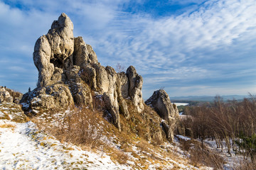 Hill of Ogrodzieniec castle in winter season. Poland