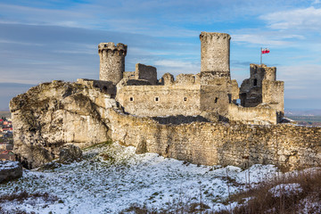 Ruins of the castle Ogrodzieniec in winter season. Poland