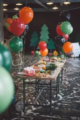 Rolgordijnen Wooden table with different type of snacks preparing for party. © Make_story Studio