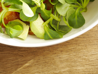 Tomato, avocado and lamb's lettuce for salad