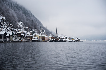 View of hallstatt village in Austria - foggy lake