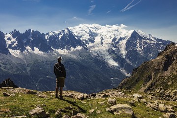 Man looking at mountains
