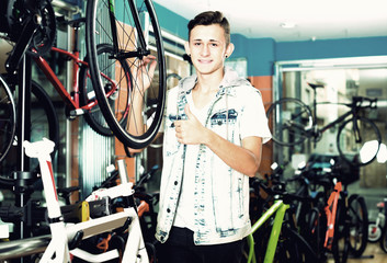 Adult teenage boy looking for new sport bike