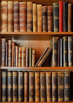 Shelves with antique books in library