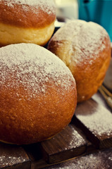 Traditional donuts with powdered sugar