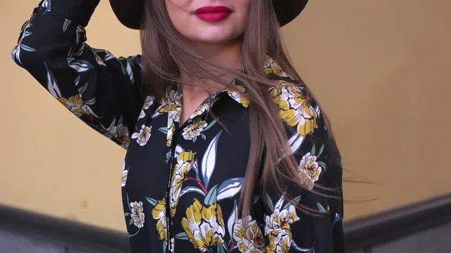 girl in the hat on the street.