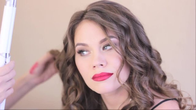 the woman curl hair Curling