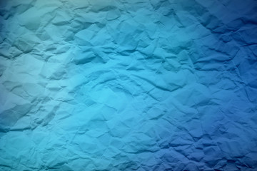 Blue texture crumpled textured faded colors on a sheet of paper