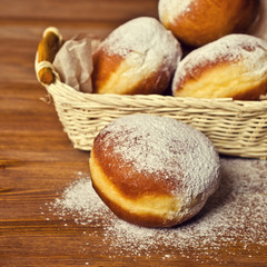 Traditional donuts with powdered sugar