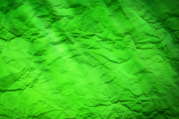 Green texture crumpled textured faded colors on a sheet of paper