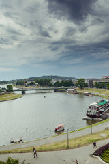 Obraz premium Scenic summer panorama of the city river in Cracow, Poland