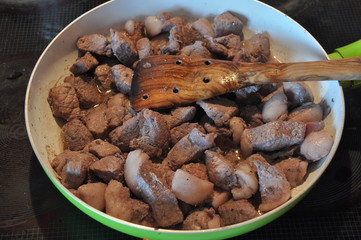 Afelia. Cypriot national dish of marinated and stewed pork in aromatic spices.
