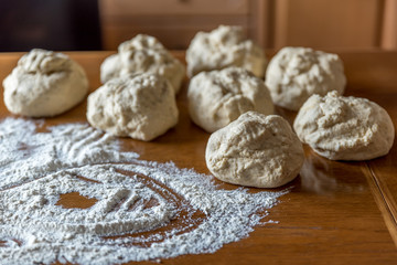 Pieces of ready pizzas dough