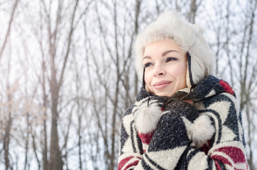 Portrait of smiling beautiful girls standing outside in the cold