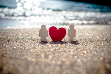Fototapeta premium romantic symbol of man and woman with a heart 