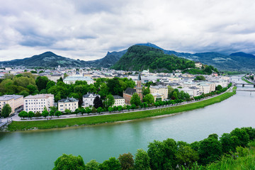 Naklejka premium Salzach River in Salzburg, Austria. Famous place Unesco Heritage Festung Hohensalzburg, Salzburger Land, Austria, Europe