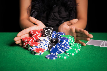 Woman playing poker with all in
