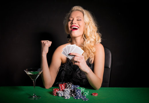 Woman wining a poker game