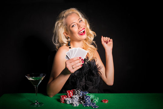 Lucky woman playing poker