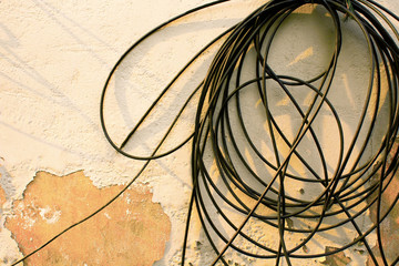 Wall with peeling paint and wires. - 134957624