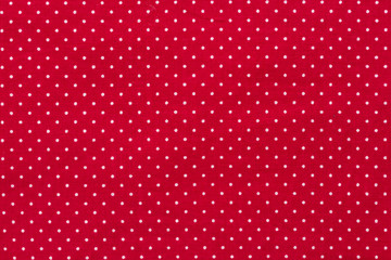 Polka dot on red canvas cotton texture, fabric background