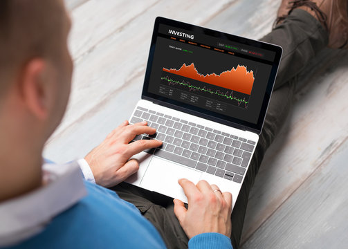 Investor using laptop