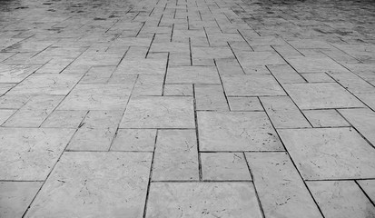 Perspective View of Monotone Grunge Cracked Gray Brick Marble Stone on The Ground for Street Road....