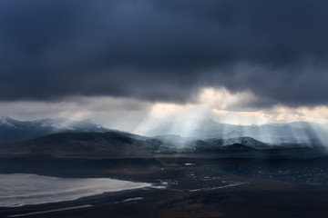 Beautiful views of the Crimean Mountains, the sun's rays make their way through the storm clouds over the mountains